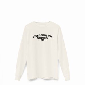 Road to Success Long Sleeve Tee in Natural – front design featuring the quote “Success Begins with Authenticity” and the Roye Life Reflection Logo.